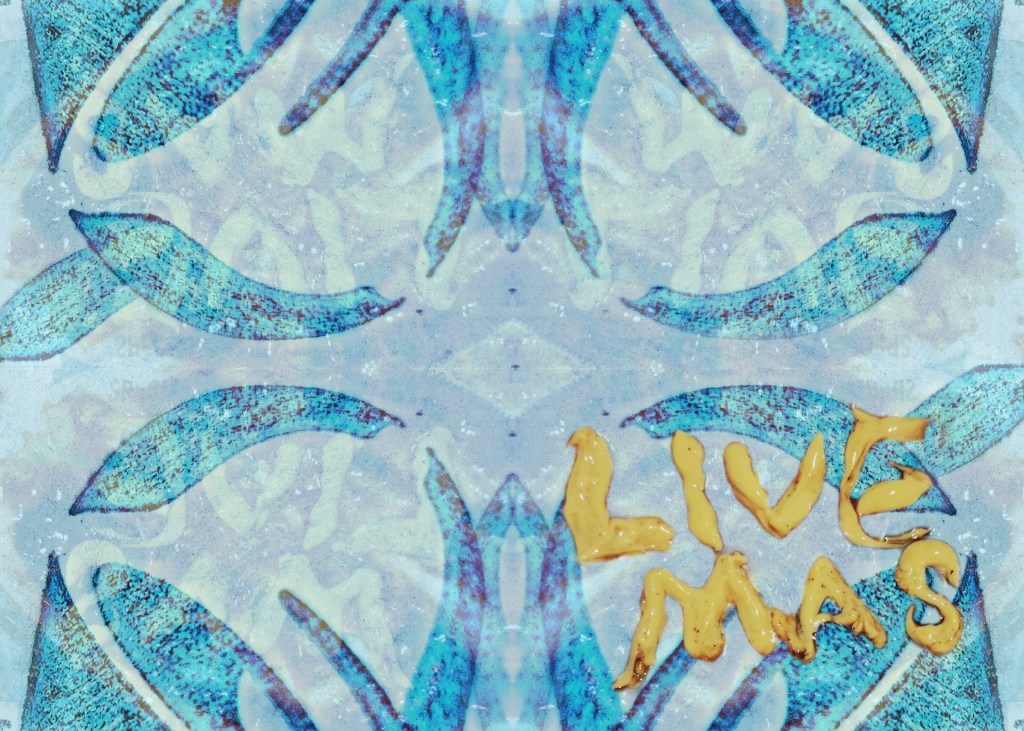 light blue pattern with slightly darker blue bell prints and the words "Live Mas" spelled in a yellow cheese sauce with shades of red hot sauce hinted at beneath.