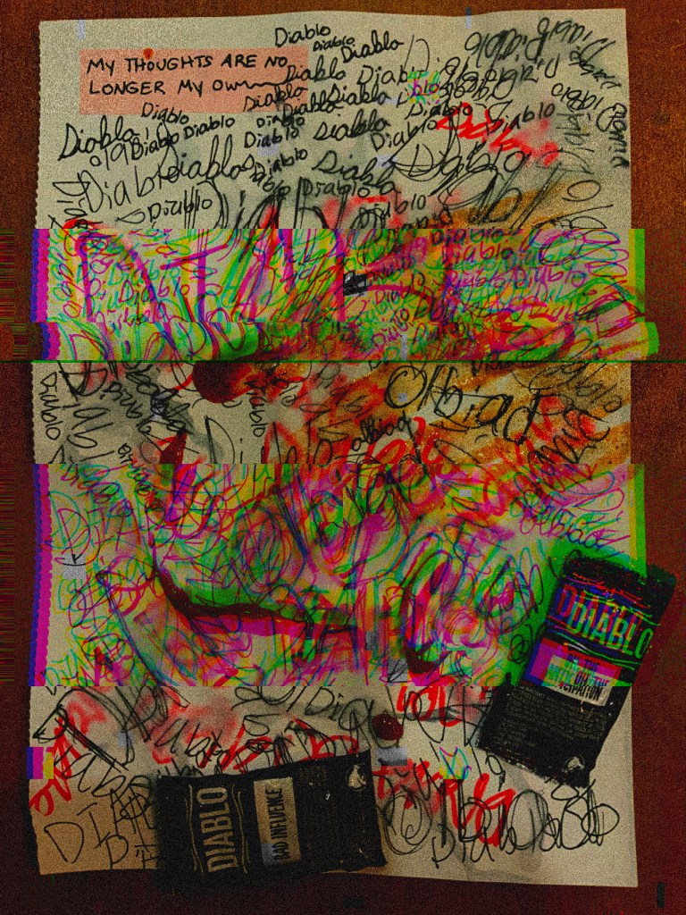 Text reads: My thoughts are no longer my own.
The "n" in "own" trails out of the text box and scribbles Diablo in cursive. Diablo is repeated all over the page in different fonts and the page looks all fucked up, there's noise in the image, a trippy effect over some of the diablos, and wwhat looks like blood. It's like the image itself is glitching out. At the bottom of the screen lie two diablo sauce packets. This is a photograph that's been manipulated, and it is taking us off the page.